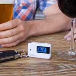 BACtrack Keychain Breathalyzer - Portable Alcohol Tester, Accurate Results, Easy To Use, USB Rechargeable -Electronics Store bactrack go keychain breathalyzer white 1 8
